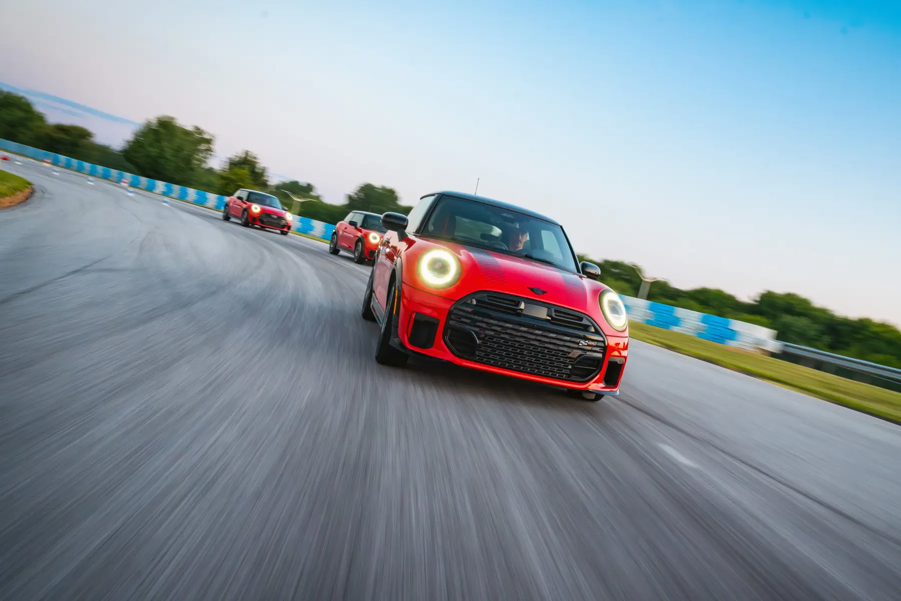 MINI Coupes driving on track