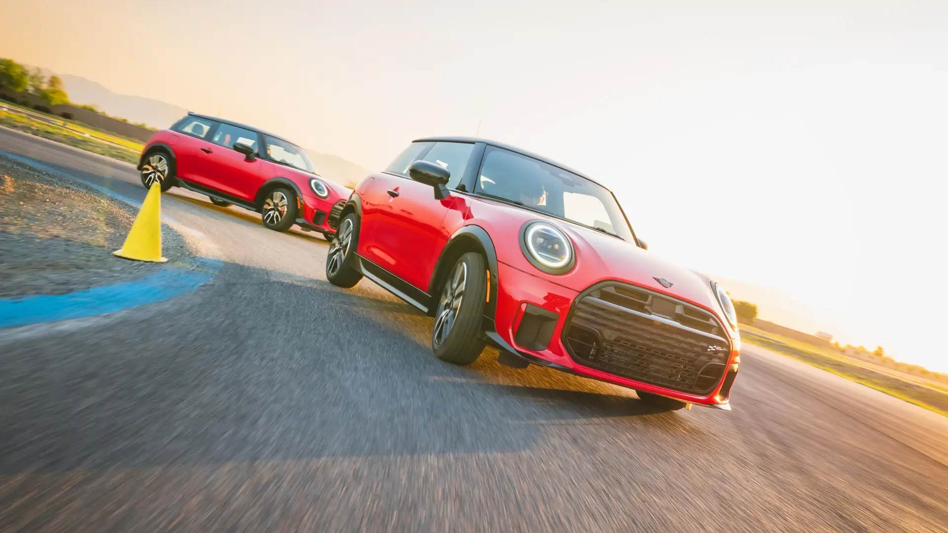 MINi Coupes driving on track