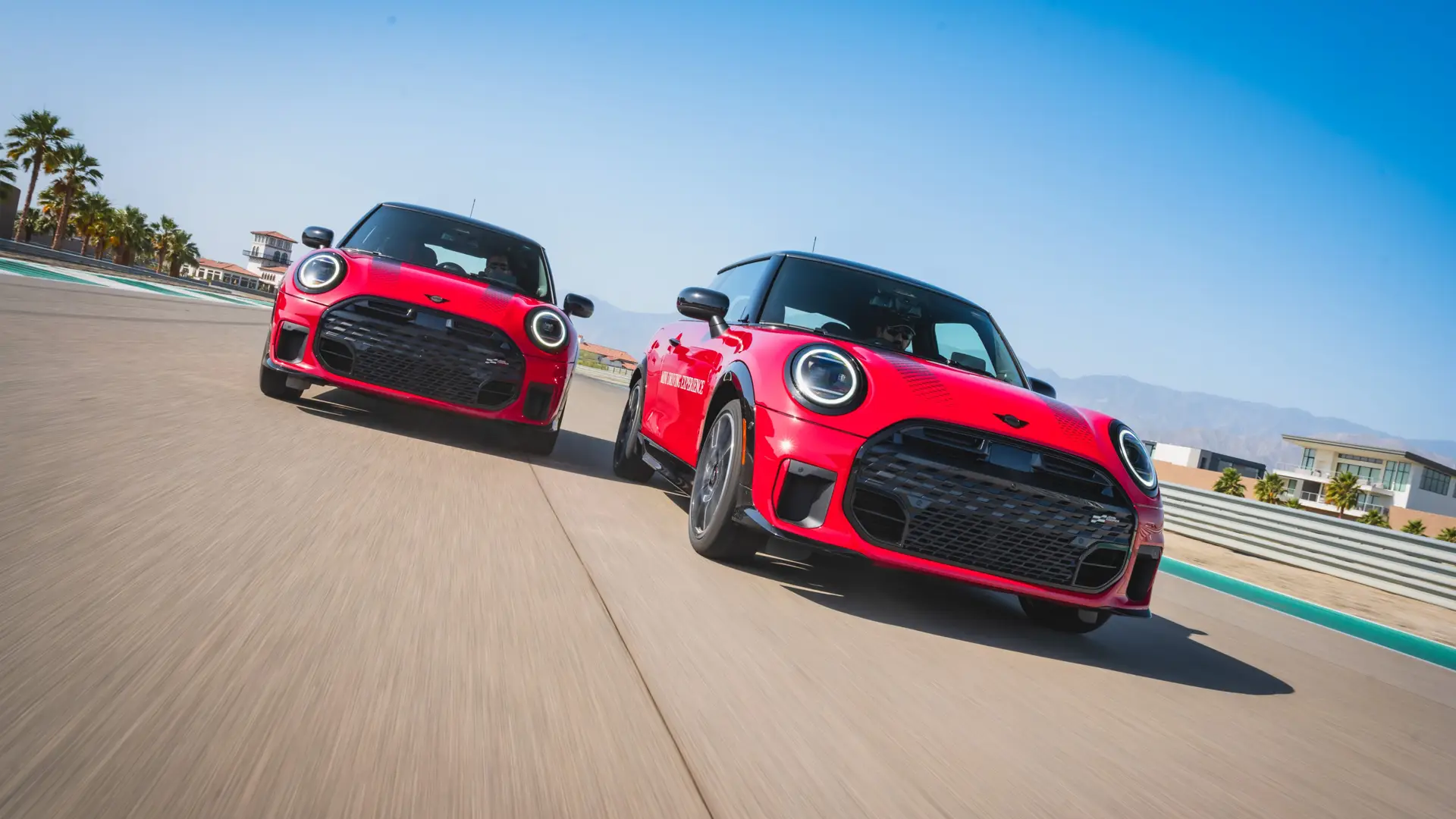 MINi Coupes driving on track